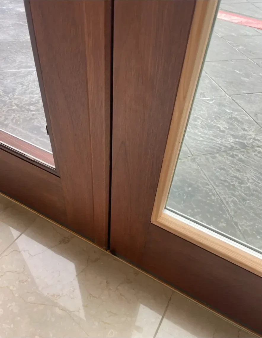 Restored mahogany stile with a new glazing bead line. Crisp, continuous, and dimensionally identical to the bead it replaced.